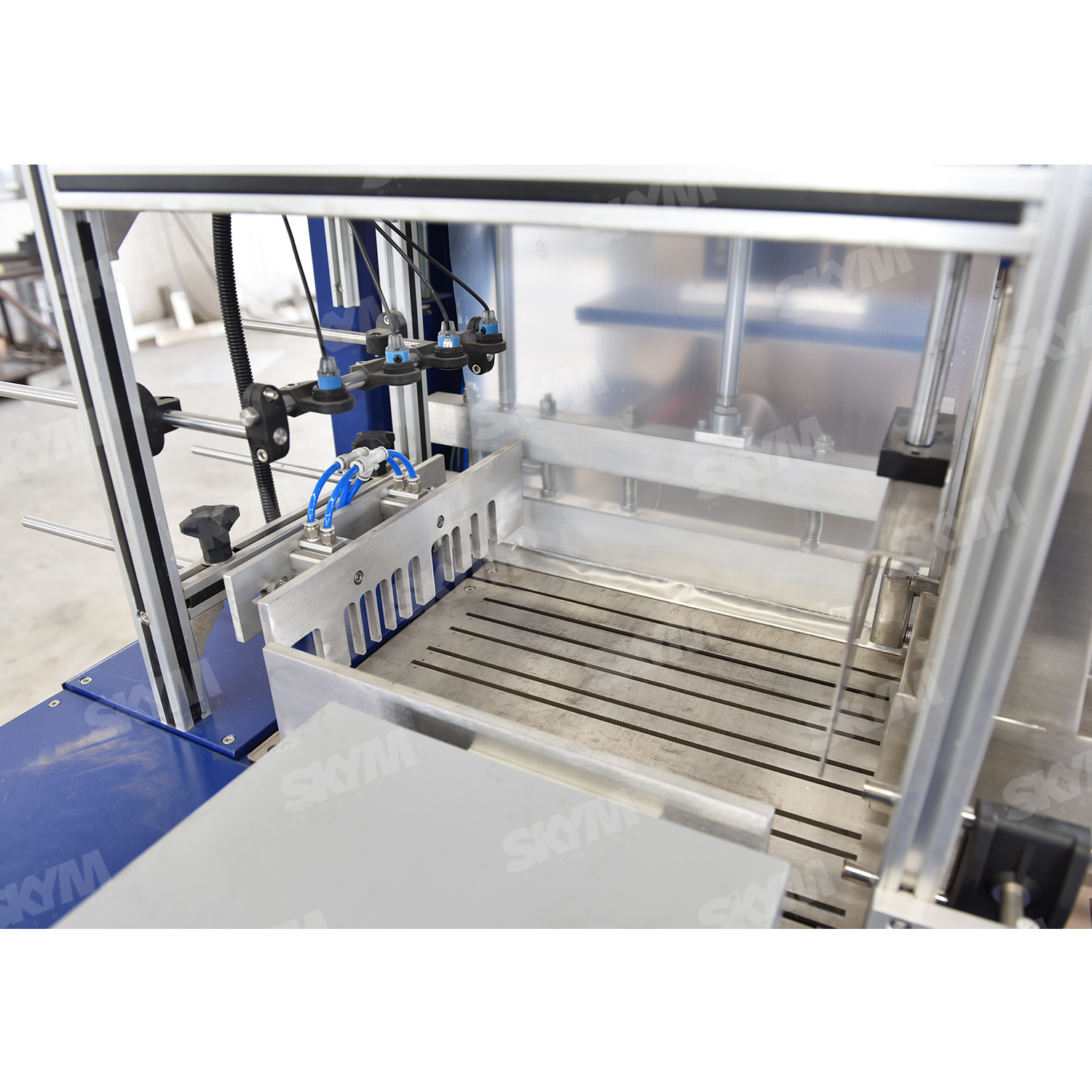 Machine de conditionnement d'emballage rétractable de bouteille de jus à grande vitesse